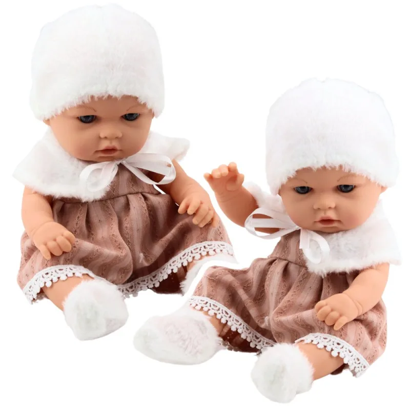 Kūdikio lėlė smėlio suknele 29 cm · 1
