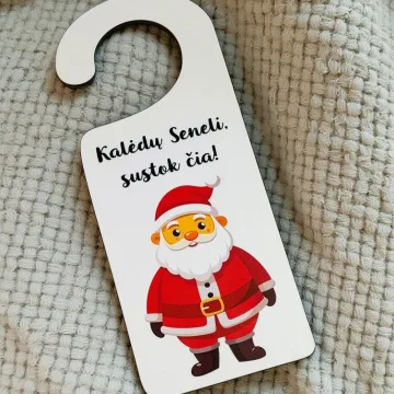 Lentelė ant durų „Kalėdų seneli sustok čia“