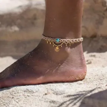 Rankų darbo boho kojos apyrankė su auksu