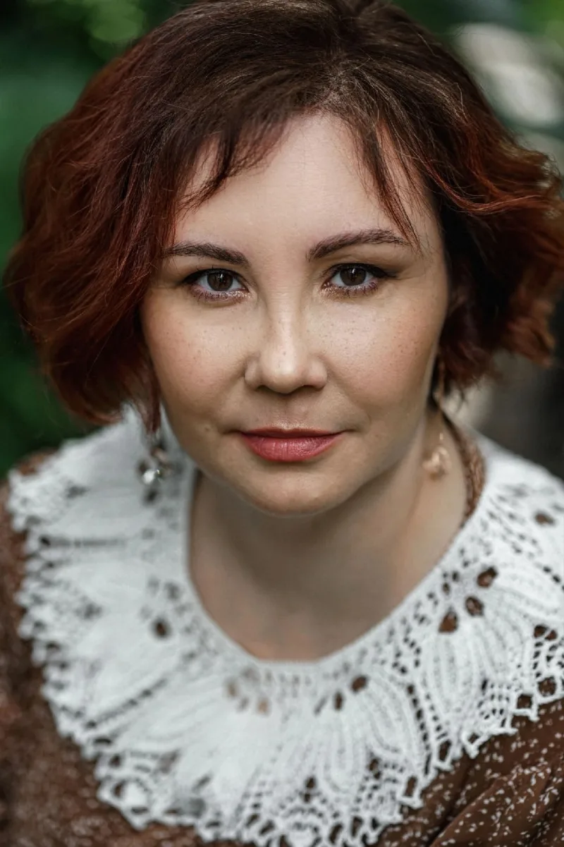 Balta rankomis megzta apykaklė